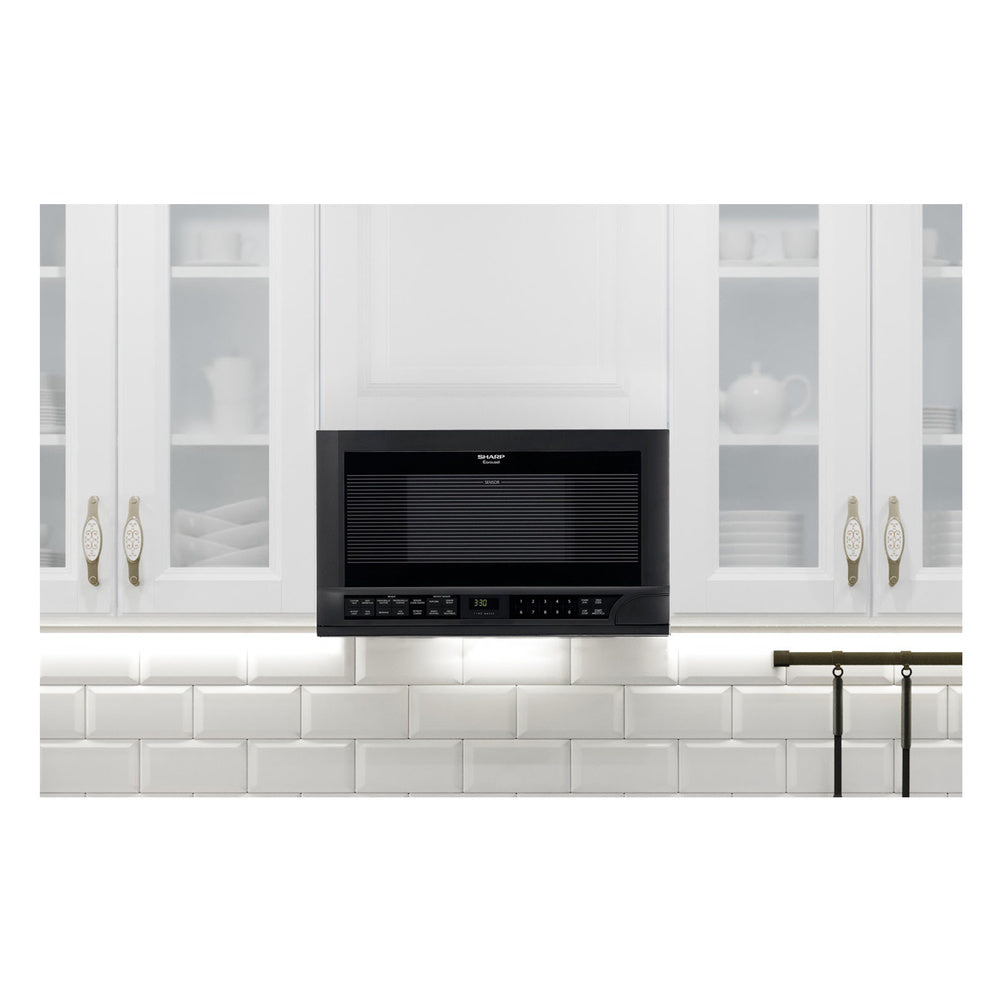 Sharp 1.5 cu. ft. 1100W Black Sharp Over-the-Counter Carousel Microwave Oven