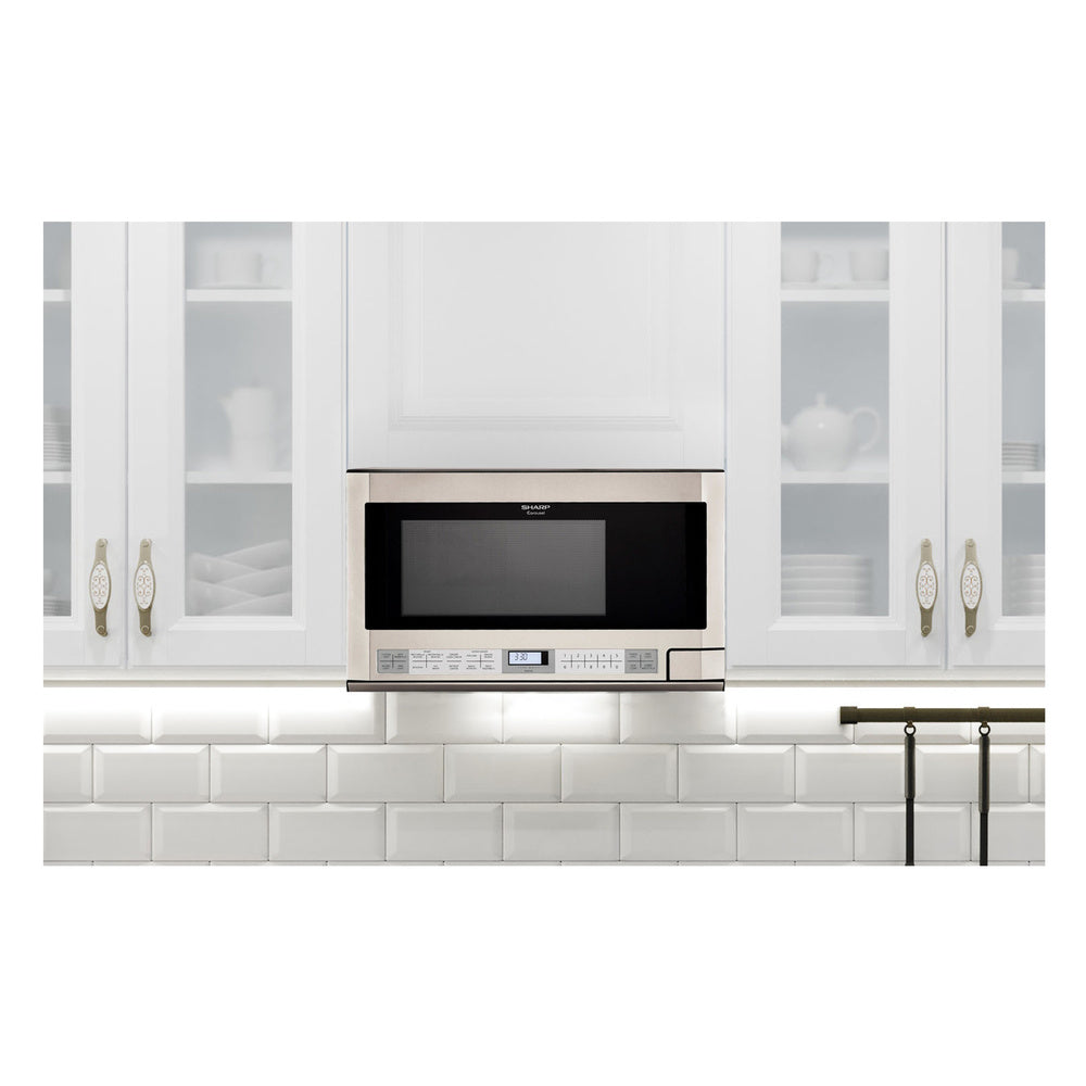 Sharp 1.5 cu. ft. 1100W Stainless Steel Sharp Over-the-Counter Carousel Microwave Oven